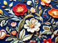 Colorful tapestry floral pattern on blue background, closeup