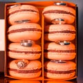 Colorful and tasty purple Macaroons with wedding rings