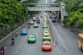 Colorful Taxi parked in a row on the road at Chatuchak, Bangkok.