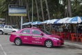 A colorful taxi parking on the car park area on the street of Pattaya