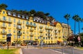 Colorful tenement houses along Rue de Foresta street with Colline du Chateau Castle hill in historic Nice Port in France Royalty Free Stock Photo