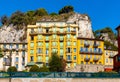 Colorful tenement houses along Rue de Foresta street with Colline du Chateau Castle hill in historic Nice Port in France Royalty Free Stock Photo