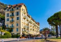 Colorful tenement houses along Rue de Foresta street with Colline du Chateau Castle hill in historic Nice Port in France Royalty Free Stock Photo