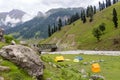 Colorful tents with high mountains in the background, Sonamarg Hill Trek in Jammu and Kashmir, India Royalty Free Stock Photo