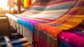 Colorful textiles on traditional loom. Artisan fabrics production Royalty Free Stock Photo