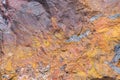 The colorful texture of natural rock. Rough stone texture background