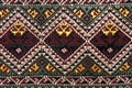 Colorful thai silk handcraft peruvian style rug surface close up Royalty Free Stock Photo