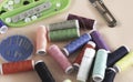 Colorful thread and needle work put on background Royalty Free Stock Photo