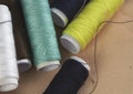 Colorful thread and needle work put on background Royalty Free Stock Photo