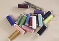 Colorful thread and needle work put on background Royalty Free Stock Photo