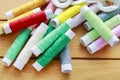 Colorful threads on wooden table Royalty Free Stock Photo