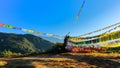 Colorful Tibetan prayer flags against early morning sun rays Royalty Free Stock Photo