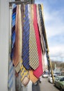 Colorful ties hang from rack outside shop in the netherlands