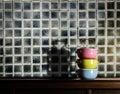 Colorful tiffin carrier on wooden cupboard Royalty Free Stock Photo