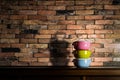 Colorful tiffin carrier on wooden cupboard Royalty Free Stock Photo