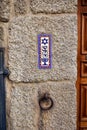 Colorful tile Mezuzah with Star of David and Menorah. Jewish Sephardic Quarter, Ribadavia, Spain. Royalty Free Stock Photo