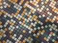 Colorful tile work in purple, white, gold, green