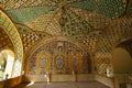 Colorful tiled ceiling of the historical terrace of Golestan Pa