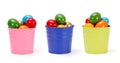 Colorful tin pails with Easter eggs Royalty Free Stock Photo