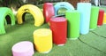 Colorful tire chairs and cylinder chairs at Playground