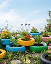 Colorful Tire Planters Create Beautiful Upcycled Garden Display Royalty Free Stock Photo
