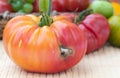 Colorful Tomato Ruined by a Wormhole Royalty Free Stock Photo