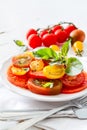 Colorful tomato salad basil