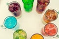 Colorful toned cocktails in big glasses on white background Royalty Free Stock Photo