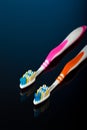 Colorful tooth brushes with reflection Royalty Free Stock Photo