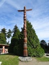 Brown Totem Pole in Staley Park in Vancouver, Canada Royalty Free Stock Photo