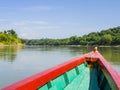 Colorful tourist boat sails on Usumacinta river for Yaxchilan archaeological site, Chiapas, Mexico-Guatemala border Royalty Free Stock Photo