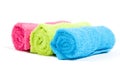 Colorful towel rolls on white background