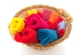 Colorful towels in cane basket Royalty Free Stock Photo