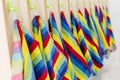 Colorful towels hang near the washbasins in kindergartens schools swimming pools