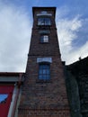 Colorful tower at the fire station built of bricks