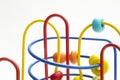 Colorful toy for preschoolers consisting of an iron structure and several balls