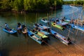 Colorful traditional Asian fishing boats in mangrove forest