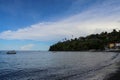 Colorful traditional Balinese fishing boats called jukungs on the volcanic beach of Amed, Bali, Indonesia Royalty Free Stock Photo