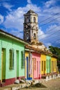 Colorful traditional houses and old church tower in the colonial town of Trinidad, Cuba Royalty Free Stock Photo