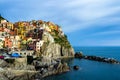 Colorful traditional houses on a rock over Mediterranean sea, Ma