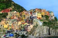 Colorful traditional houses on a rock over Mediterranean sea, Ma
