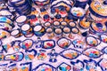Colorful traditional Mexican pottery. Talavera style. Souvenirs on sale in local market of Puebla, Mexico Royalty Free Stock Photo