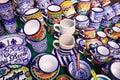 Colorful traditional Mexican pottery. Talavera style. Souvenirs on sale in local market of Puebla, Mexico Royalty Free Stock Photo