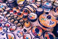 Colorful traditional Mexican pottery. Talavera style. Souvenirs on sale in local market of Puebla, Mexico Royalty Free Stock Photo