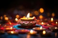 Colorful traditional oil lamps diya lit during diwali celebration. Hindu festival of lights celebration. AI generated Royalty Free Stock Photo