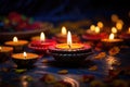 Colorful traditional oil lamps diya lit during diwali celebration. Hindu festival of lights celebration. AI generated Royalty Free Stock Photo