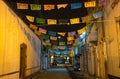 Colorful traditional paper flags are known as `papel picado` hanging at a Day of the Dead celebration