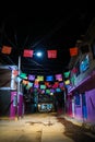 Colorful traditional paper flags are known as `papel picado` hanging at a Day of the Dead celebration