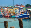 Colorful Traditional Thai Fishing Boats in the marina