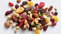 Colorful trail mix scattered on a white surface Royalty Free Stock Photo